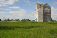 grain elavator landscape photograph Grain Elevator Prairie fields in Southern Manitoba, Minnedosa, Brandon, Canola Field.